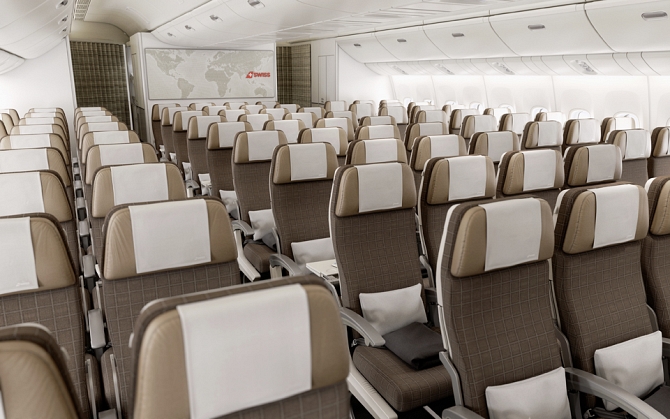 //www.pasazer.com/img/images/normal/swiss,new,cabin,b777300er,media%20(12).jpg