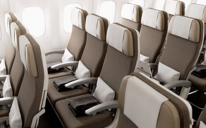 //www.pasazer.com/img/images/normal/swiss,new,cabin,b777300er,media%20(13).jpg